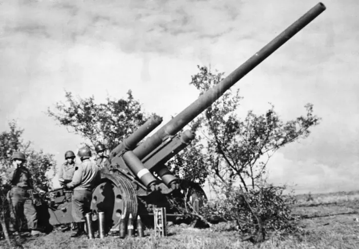 Framed Print : Captured German field artillery Holding shell is Private Michael Malecalva Framed Print : Captured German field artillery Holding shell is Private Michael Malecalva
