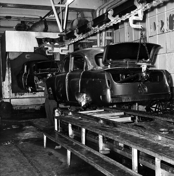 Car bodies move along the assembly line at the Moskvitch car plant in Moscow. 1962