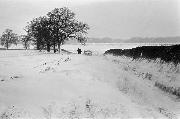 A car stuck in the snow, Berkshire. January 1982