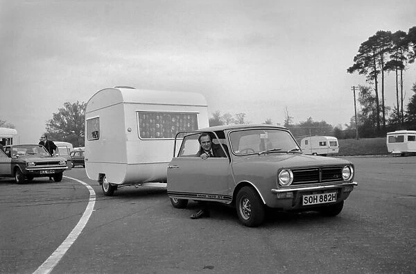 A caravan being towed by a mini clubman car. November 1969 Z10726-005
