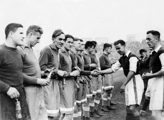 Framed Print : Cardiff City players present the Dynamo Moscow players with miner Framed Print : Cardiff City players present the Dynamo Moscow players with miner
