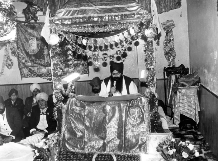 Framed Print : Cardiff - Religion - Priest Charananjit Singh holds a reading at the Sikh temple in