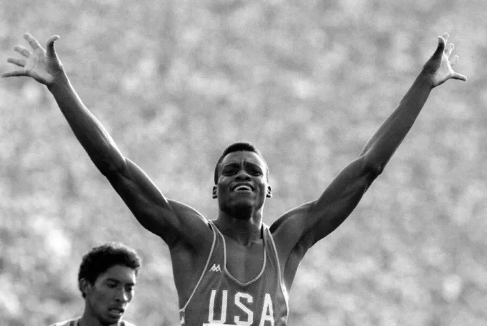 Framed Print : Carl Lewis of the United States of America wins gold in the Mens 200 meters Final Framed Print : Carl Lewis of the United States of America wins gold in the Mens 200 meters Final