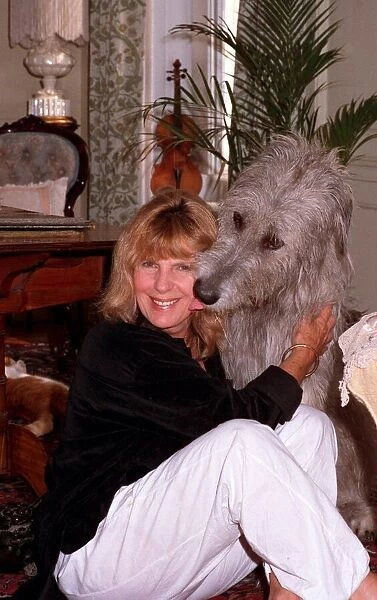 CARLA LANE (TV WRITER) WITH HER DOG 16  /  06  /  1989