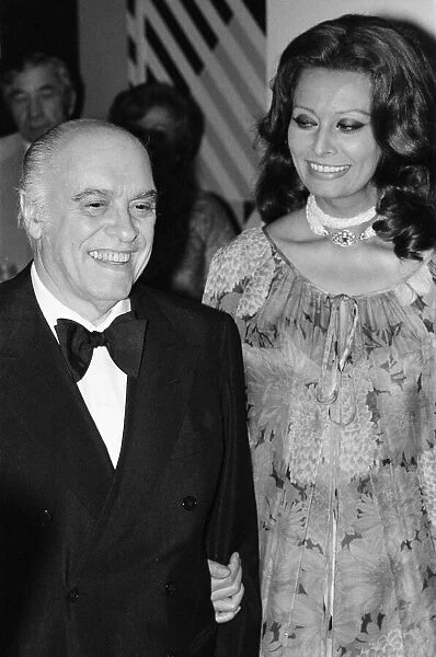 Carlo Ponti and Sophia Loren attend a dinner at the Sporting Casino, Monte Carlo