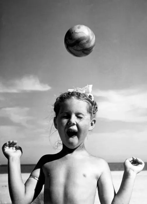 Framed Print : Carol Barwell, aged five, with a beach ball. 2nd August 1950