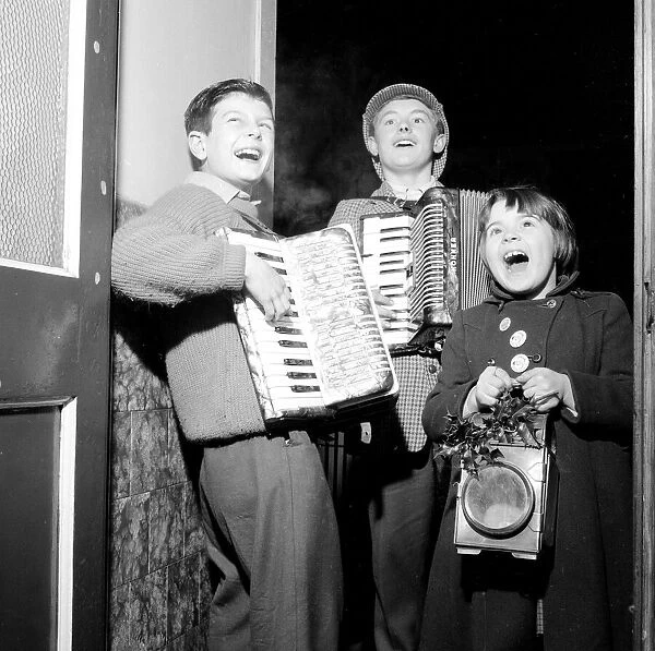 Three Carol singers from Canton, Cardiff, who tour the neighbourhood at Christmas time