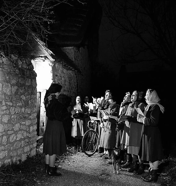 Carol Singers at Long Crendon in Buckinghamshire. November 1952 C5558