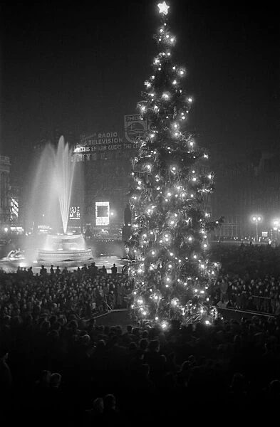Carol singing around the Christmas Tree in Trafalgar Square, London
