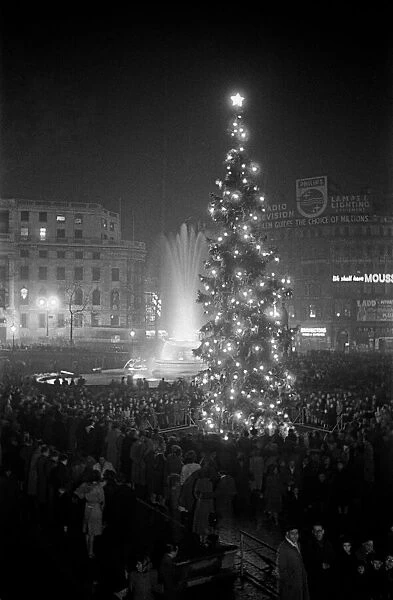 Carol singing around the Christmas Tree in Trafalgar Square, London