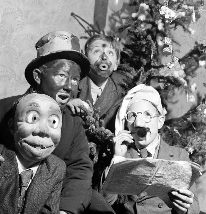 Framed Print : Carol singing with a differenc. When these four lads from Bristol go carolling in their Framed Print : Carol singing with a differenc. When these four lads from Bristol go carolling in their