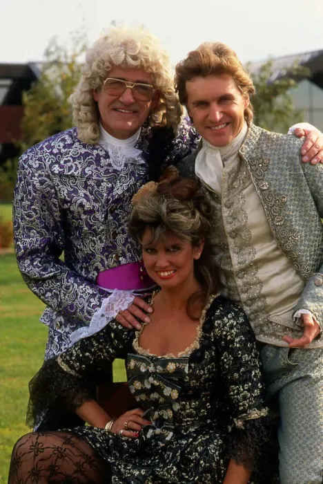 Framed Print : Caroline Munro with Jim Bowen & Michael Howe 1986 Framed Print : Caroline Munro with Jim Bowen & Michael Howe 1986
