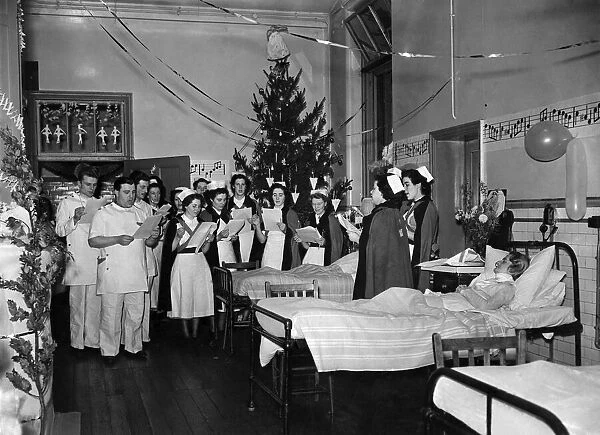 Carols in the wards at Salford Royal Hospital. Christmas Eve