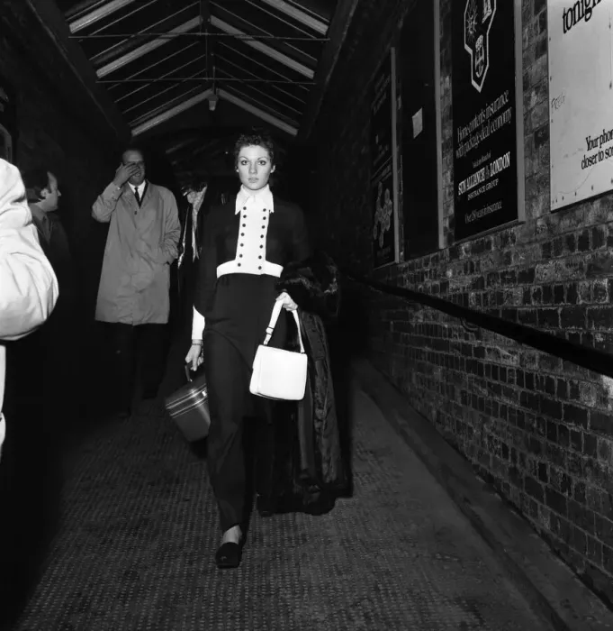 Framed Print : Carolyn Moore walks along the subway at Wilmslow station on her way to meet George Best Framed Print : Carolyn Moore walks along the subway at Wilmslow station on her way to meet George Best