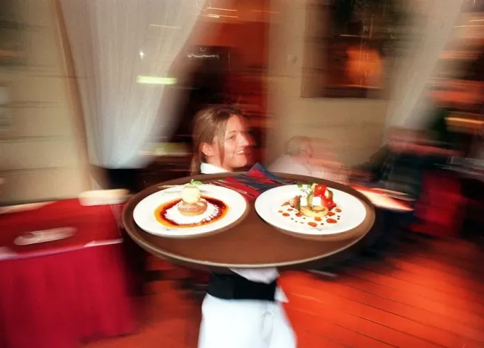 Framed Print : Carrie Barr waitress March 1999 at the Holiday Inn Glasgow Carying tray with