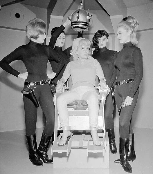 Carry On Spying Film 1964 Filming at Pinewood Studios Barbara Windsor manacled to