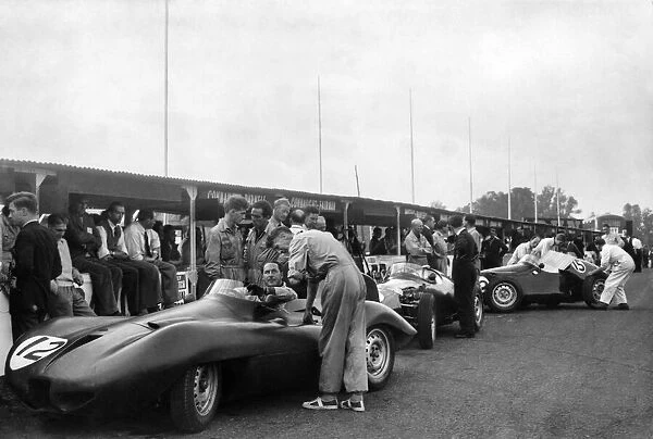 Cars in the pit area at Oulton Park in Cheshire during a racing meet September