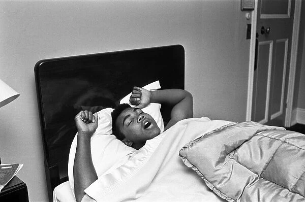 Cassius Clay aka (Muhammad Ali) catches up on some sleep in the Piccadilly Hotel