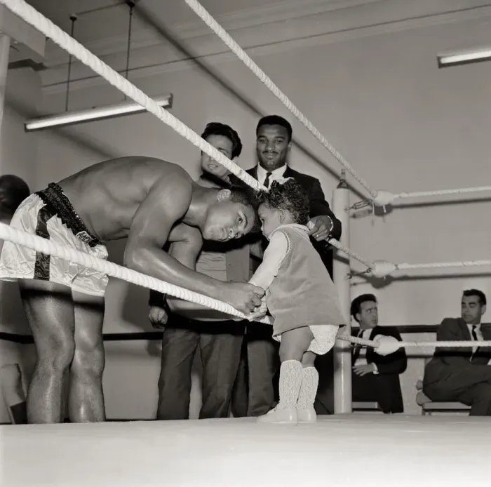 Framed Print : Cassius Clay, August 1966 With 12 months old Maria Morin