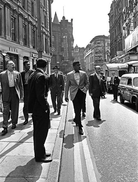 Cassius Clay (Muhammad Ali) (centre) in London England ahead of his next fight