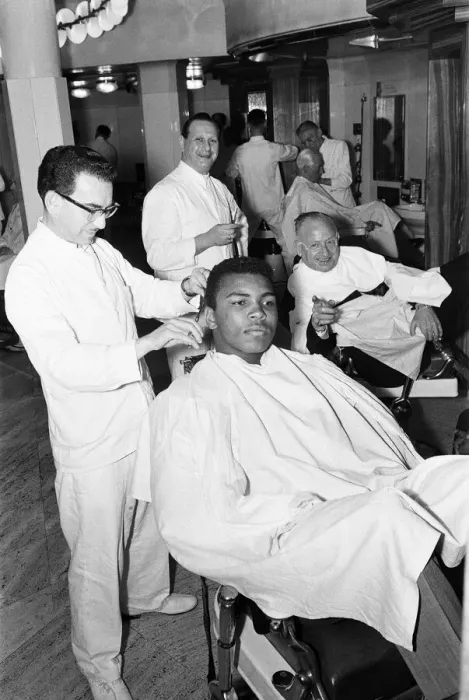 Framed Print : Cassius Clay (Muhammad Ali) seen here in the hairdressing salon of Austin Reeds in