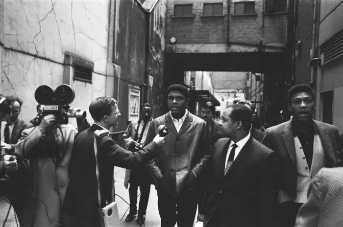 Framed Print : Cassius Clay (Muhammad Ali) seen here being interviewed by a BBC camera crew during a