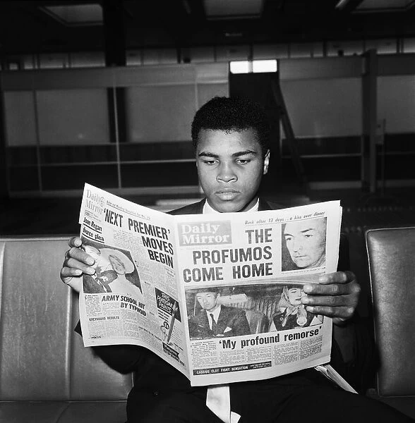 Cassius Clay reading the Daily Mirror, after his World Title Fight win against Henry