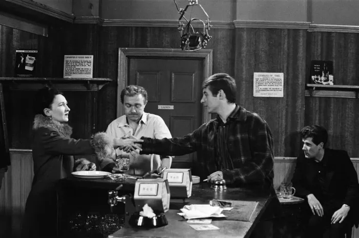 Framed Print : The cast of Coronation Street on set. Eileen Derbyshire behind the bar of Framed Print : The cast of Coronation Street on set. Eileen Derbyshire behind the bar of