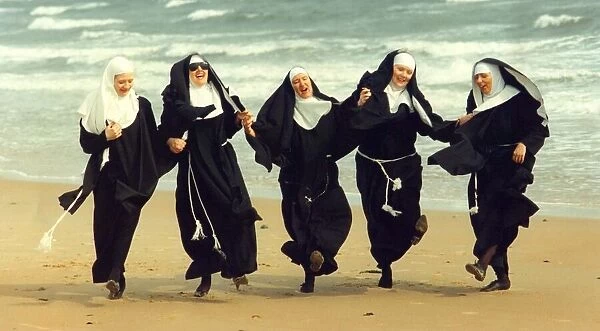 The cast of Nunsense at the Phoenix Theatre in Blyth mess about on the beach before