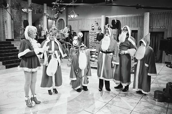 The cast of Are you being served pictured during the shooting of their