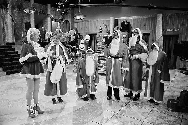 The cast of Are You Being Served? pictured during the shooting of their