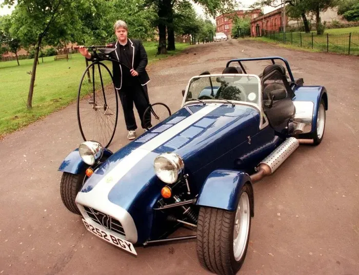 Framed Print : Caterham sports car July 1998 John Moran holding a Penny Farthing bicycle bike Framed Print : Caterham sports car July 1998 John Moran holding a Penny Farthing bicycle bike