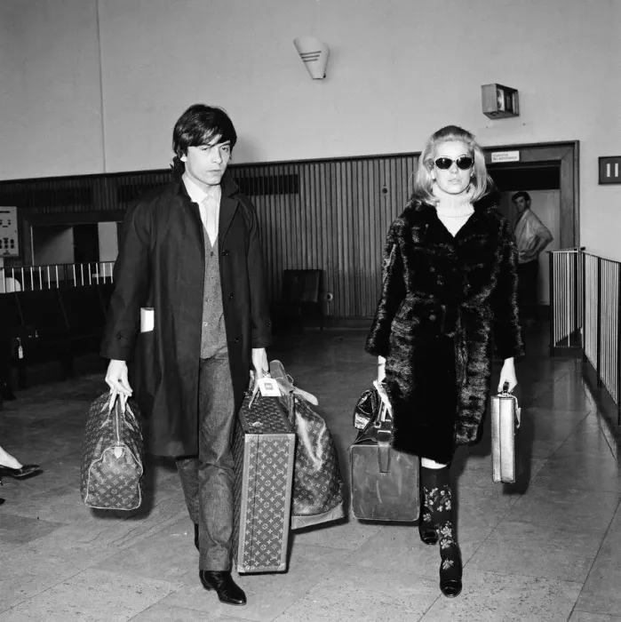 Framed Print : Catherine Deneuve, actress, and husband fashion photographer David Bailey arrive Framed Print : Catherine Deneuve, actress, and husband fashion photographer David Bailey arrive