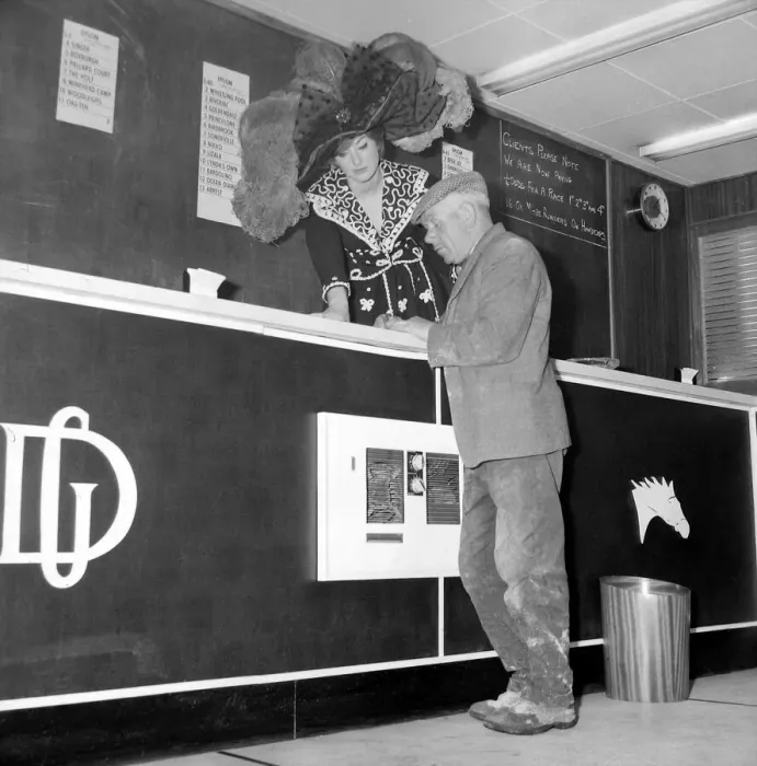 Framed Print : To celebrate the beginning of the Epsom meeting, bookmaker Gus Demmy decided to brighten