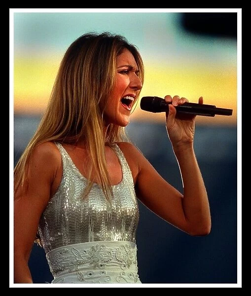 Celine Dion at Murrayfield Edinburgh July 1999 Silver dress singing into microphone