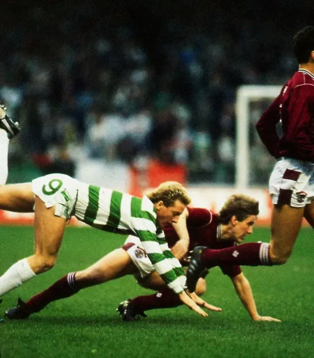Framed Print : Celtic versus Hearts Premier League football Frank McAvennie tumbles after Framed Print : Celtic versus Hearts Premier League football Frank McAvennie tumbles after