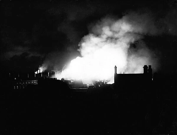 The centre of Hull alight following the blitz of the 8th May 1941