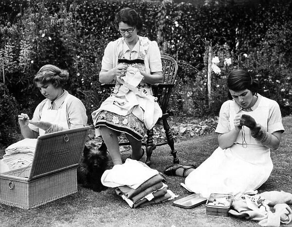 In the centre is Mrs Allister, with her two assistants, Miss Mary Brown (left