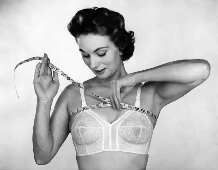 Framed Print : Chain store buyer says women do not know their correct bust size so have devised a method