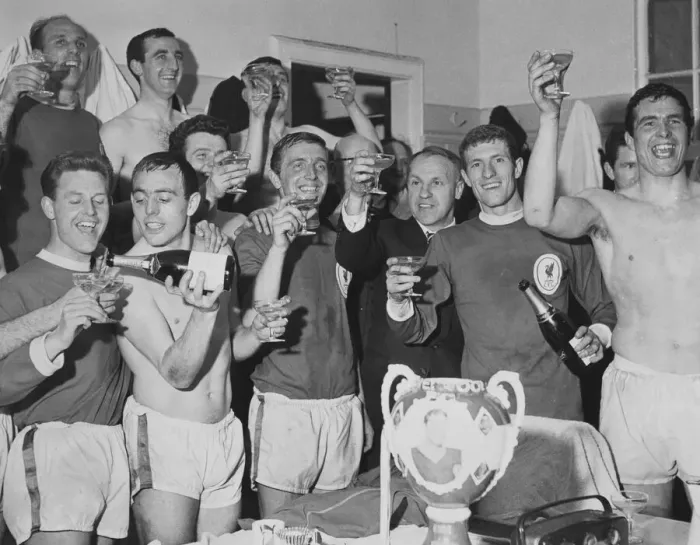 Framed Print : Champagne in the dressing room after Liverpool had clinched the League Championship by