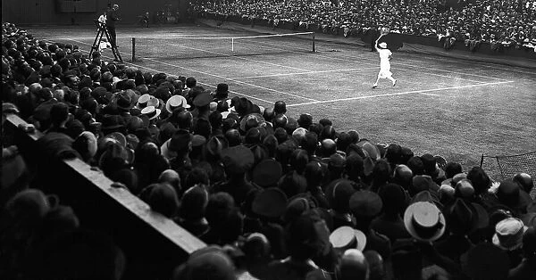 Championship tennis at Wimbledon - Miss Suzanne Lenglen in play on Centre Court