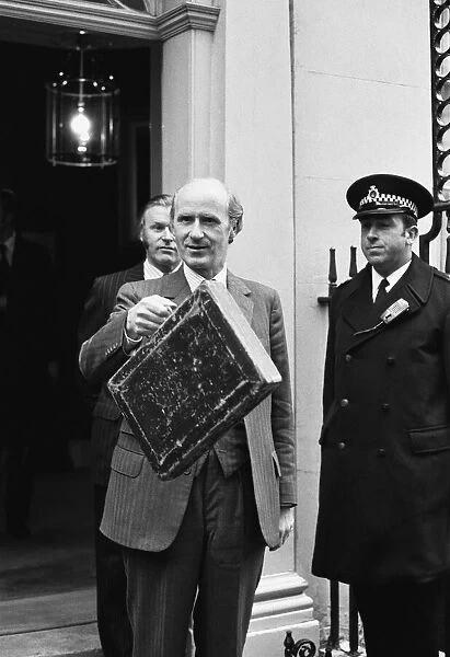 Chancellor of the Exchequer Anthony Barber holds up his red budget box as he leaves