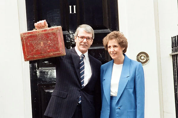 Chancellor of the Exchequer John Major at 11 Downing Street with his wife Norma as he