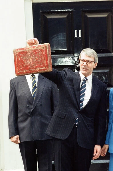 Chancellor of the Exchequer John Major at 11 Downing Street as he delivers his first