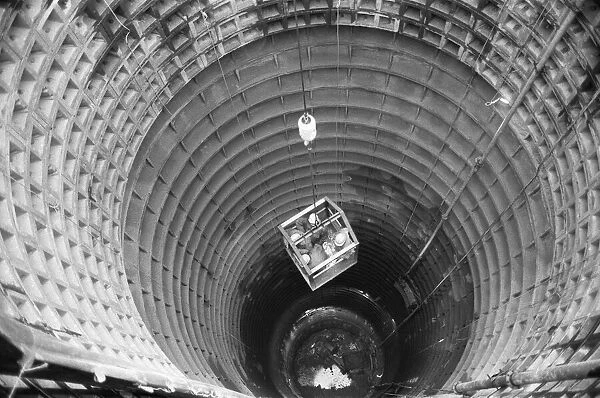 Channel Tunnel Construction 28th November 1987. Workers being lowered down into