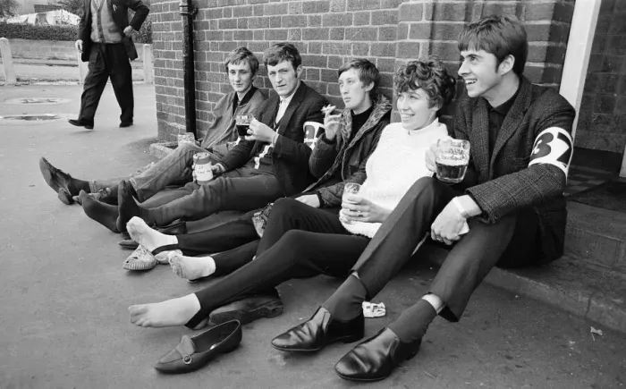 Framed Print : Charity Walk Completed, these young participants enjoy a rest and pint of beer Framed Print : Charity Walk Completed, these young participants enjoy a rest and pint of beer