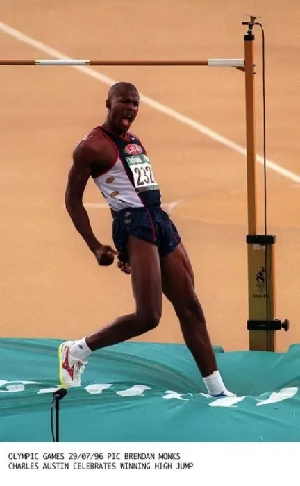  : Charles Austin USA celebrates after winning gold in the high jump in the Atlanta Olympic