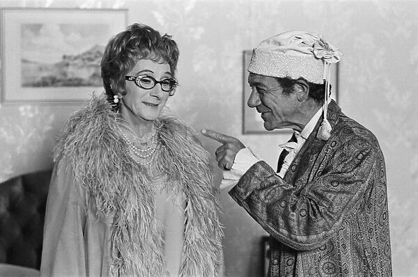 Charles Hawtrey (left) and Sid James (right) filming Carry On Again Doctor
