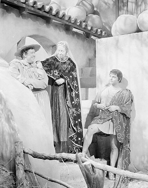 Charles Laughton actor and Dame Flora Robson actress on the set of a film in costume