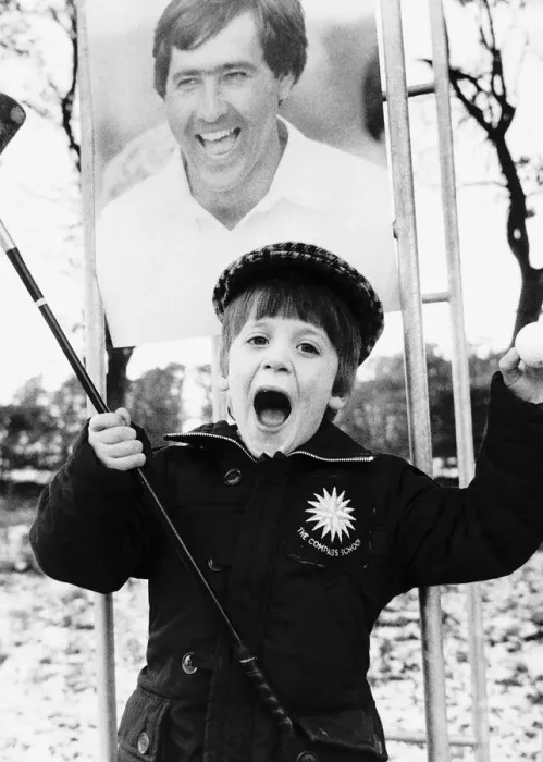 Framed Print : Charles Simpson young boy golfer lesson from picture of Seve Ballesteros holding golf Framed Print : Charles Simpson young boy golfer lesson from picture of Seve Ballesteros holding golf